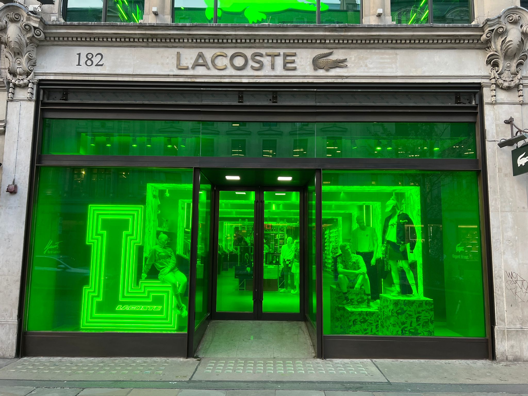 Lacoste on Regent Street with green window graphics