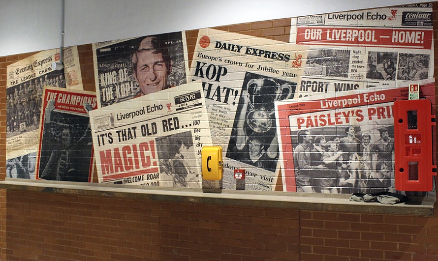 Liverpool Football Club printed wallpaper on brickwork