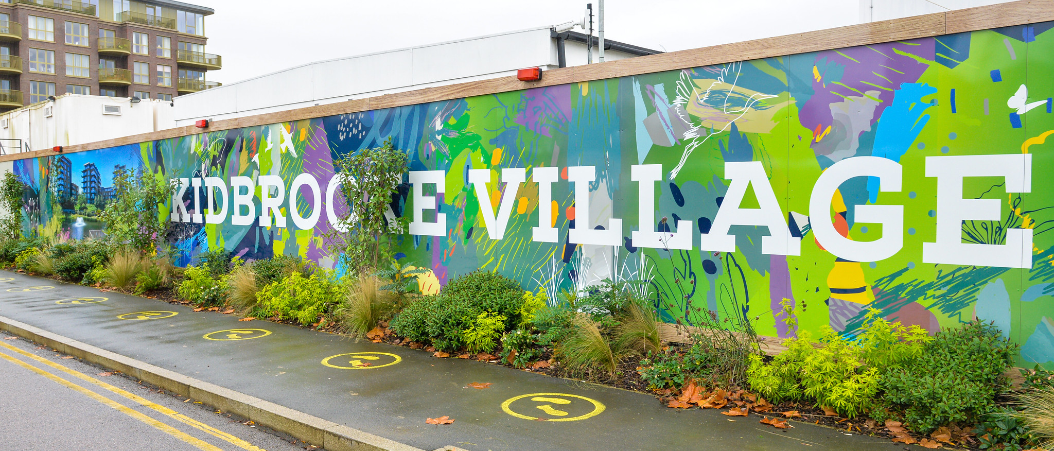 Kidbrooke Village Graphic Hoardings with plants