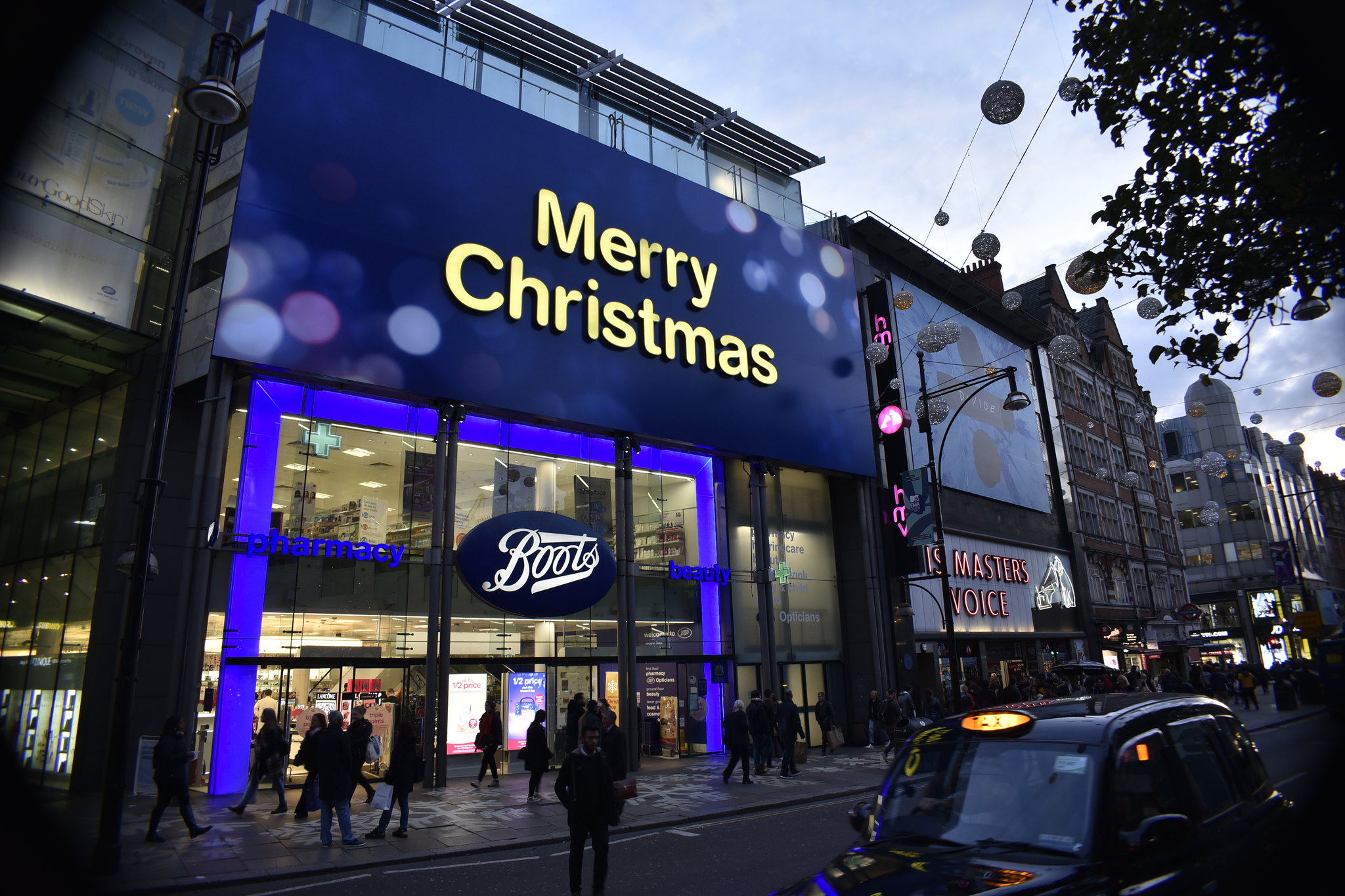 Boots Merry Christmas Signage