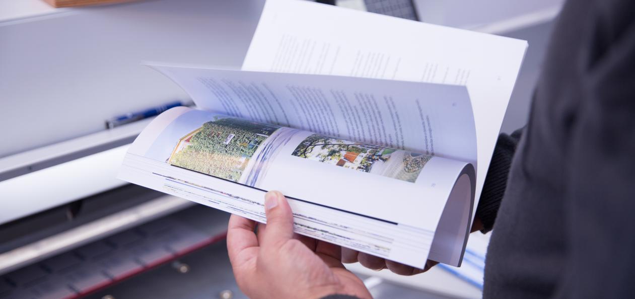 looking through booklet