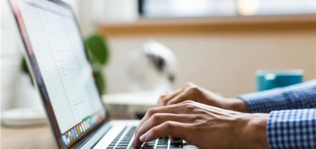 typing on a laptop keyboard