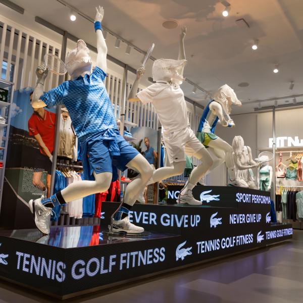 Lacoste In-store retail digital display with crocodile mannequins