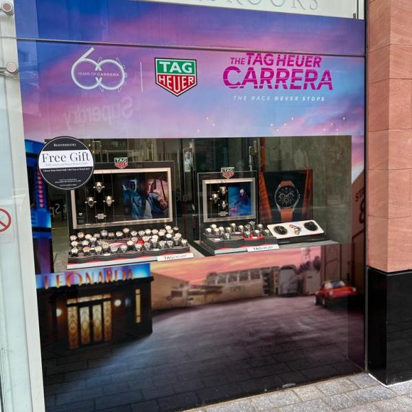 TAG Heur Carrera retail window graphics display