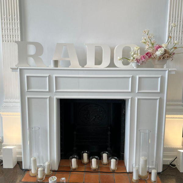 Rado branding above  fireplace